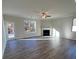 Spacious living room with fireplace and hardwood floors at 3627 Lockaby Way, Lawrenceville, GA 30044