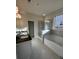 Bathroom with soaking tub, shower, and double vanity at 3627 Lockaby Way, Lawrenceville, GA 30044