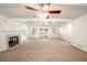 Spacious living room with fireplace and French doors at 3060 Orchard Sw Rd, Conyers, GA 30094