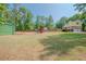 Spacious backyard with shed and playset at 3060 Orchard Sw Rd, Conyers, GA 30094