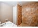 Basement bathroom with tile shower and vanity at 3060 Orchard Sw Rd, Conyers, GA 30094