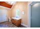 Bathroom with tile floor, vanity, and shower at 3060 Orchard Sw Rd, Conyers, GA 30094