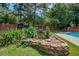 Serene koi pond with lush greenery at 3060 Orchard Sw Rd, Conyers, GA 30094
