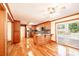Open concept kitchen with hardwood floors and island at 3060 Orchard Sw Rd, Conyers, GA 30094