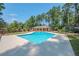 Relaxing kidney-shaped pool with large deck space at 3060 Orchard Sw Rd, Conyers, GA 30094