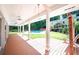 Spacious pool deck with a covered porch offering ample shade at 3060 Orchard Sw Rd, Conyers, GA 30094