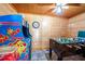Game room with foosball table and Pac-Personal game at 3060 Orchard Sw Rd, Conyers, GA 30094