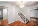 Entryway with hardwood floors, chandelier, and staircase at 3060 Orchard Sw Rd, Conyers, GA 30094