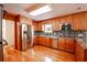 Updated kitchen with granite countertops and stainless steel appliances at 3060 Orchard Sw Rd, Conyers, GA 30094