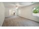 Bright living room with views into another living space at 3060 Orchard Sw Rd, Conyers, GA 30094
