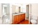 Bathroom boasts granite countertops and a double vanity at 3060 Orchard Sw Rd, Conyers, GA 30094