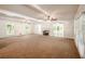 Bright living room featuring hardwood floors and a fireplace at 3060 Orchard Sw Rd, Conyers, GA 30094