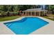 Inviting pool and detached pool house at 3060 Orchard Sw Rd, Conyers, GA 30094