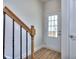 Inviting entryway with wood staircase and durable flooring at 6202 Ripple Way # 88, South Fulton, GA 30349