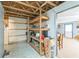 Unfinished basement with shelving for storage at 160 Country Mill Ln, Stockbridge, GA 30281