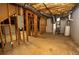 Unfinished basement with HVAC and water heater at 994 Rolling Forest Ln, Lilburn, GA 30047