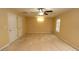 Spacious bedroom with neutral walls, carpet, and ample closet space at 994 Rolling Forest Ln, Lilburn, GA 30047