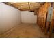 Unfinished basement with exposed framing and electrical panel at 994 Rolling Forest Ln, Lilburn, GA 30047