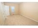Bright bedroom featuring neutral walls and carpeted floors at 994 Rolling Forest Ln, Lilburn, GA 30047