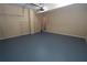 Garage with extra storage shelving and interior access at 994 Rolling Forest Ln, Lilburn, GA 30047