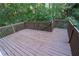 Large deck overlooking wooded area at 994 Rolling Forest Ln, Lilburn, GA 30047