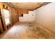 Unfinished basement with window and plumbing at 994 Rolling Forest Ln, Lilburn, GA 30047