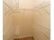 Walk-in closet with wire shelving at 994 Rolling Forest Ln, Lilburn, GA 30047