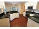 Eat-in kitchen with an island, granite countertops and stainless steel appliances at 994 Rolling Forest Ln, Lilburn, GA 30047
