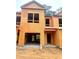 Brand new two-story townhome, under construction, featuring two-car garage at 6206 Ripple Way # 89, South Fulton, GA 30349