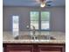 Kitchen sink with granite countertop and stainless steel double sink at 6206 Ripple Way # 89, South Fulton, GA 30349
