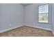 Bright bedroom with carpeted floor and window with blinds at 6206 Ripple Way # 89, South Fulton, GA 30349