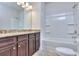 Bathroom boasts double vanity, granite countertop and bathtub at 6206 Ripple Way # 89, South Fulton, GA 30349
