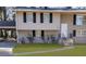 Two-story home with brick facade and landscaped yard at 2900 Bradmoor Ct, Decatur, GA 30034