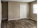 Spacious bedroom featuring wood-look flooring and a double door closet at 2900 Bradmoor Ct, Decatur, GA 30034
