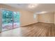 Spacious finished basement with sliding glass doors leading to the backyard at 3993 Snapfinger Way, Decatur, GA 30035
