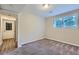 Basement bedroom with carpet, window, and exterior access at 3993 Snapfinger Way, Decatur, GA 30035