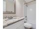 Bathroom with granite countertop, white vanity, and bathtub at 3993 Snapfinger Way, Decatur, GA 30035