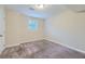 Basement bedroom with carpet and window at 3993 Snapfinger Way, Decatur, GA 30035