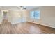 Bright living room with hardwood floors and a view of the staircase at 3993 Snapfinger Way, Decatur, GA 30035