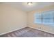 Simple bedroom with carpet and window with blinds at 3993 Snapfinger Way, Decatur, GA 30035
