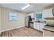 Updated kitchen featuring white cabinets, granite countertops and stainless steel appliances at 3993 Snapfinger Way, Decatur, GA 30035
