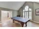 Game room with table tennis table and hardwood floors at 2000 Shadwell Way, Lawrenceville, GA 30043