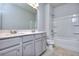 Bathroom with double vanity and shower/tub combo at 6214 Ripple Way # 91, South Fulton, GA 30349