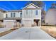 Two story townhome with attached garage and driveway at 6214 Ripple Way # 91, South Fulton, GA 30349