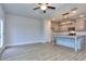 Open concept dining room with kitchen and wood floors at 6214 Ripple Way # 91, South Fulton, GA 30349