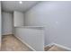 Upstairs hallway with neutral walls and carpet flooring at 6214 Ripple Way # 91, South Fulton, GA 30349