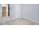 Simple bedroom with neutral walls and carpeting, and an attached bathroom at 6214 Ripple Way # 91, South Fulton, GA 30349