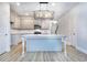 Modern kitchen with gray cabinets, island and granite countertops at 6214 Ripple Way # 91, South Fulton, GA 30349