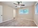 Spacious bedroom with neutral decor, ceiling fan and ample natural light at 2184 Pemberton Sw Rd, Atlanta, GA 30331