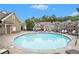 Relaxing community pool with plenty of lounge chairs and patio furniture at 260 Trecastle Sq, Canton, GA 30114